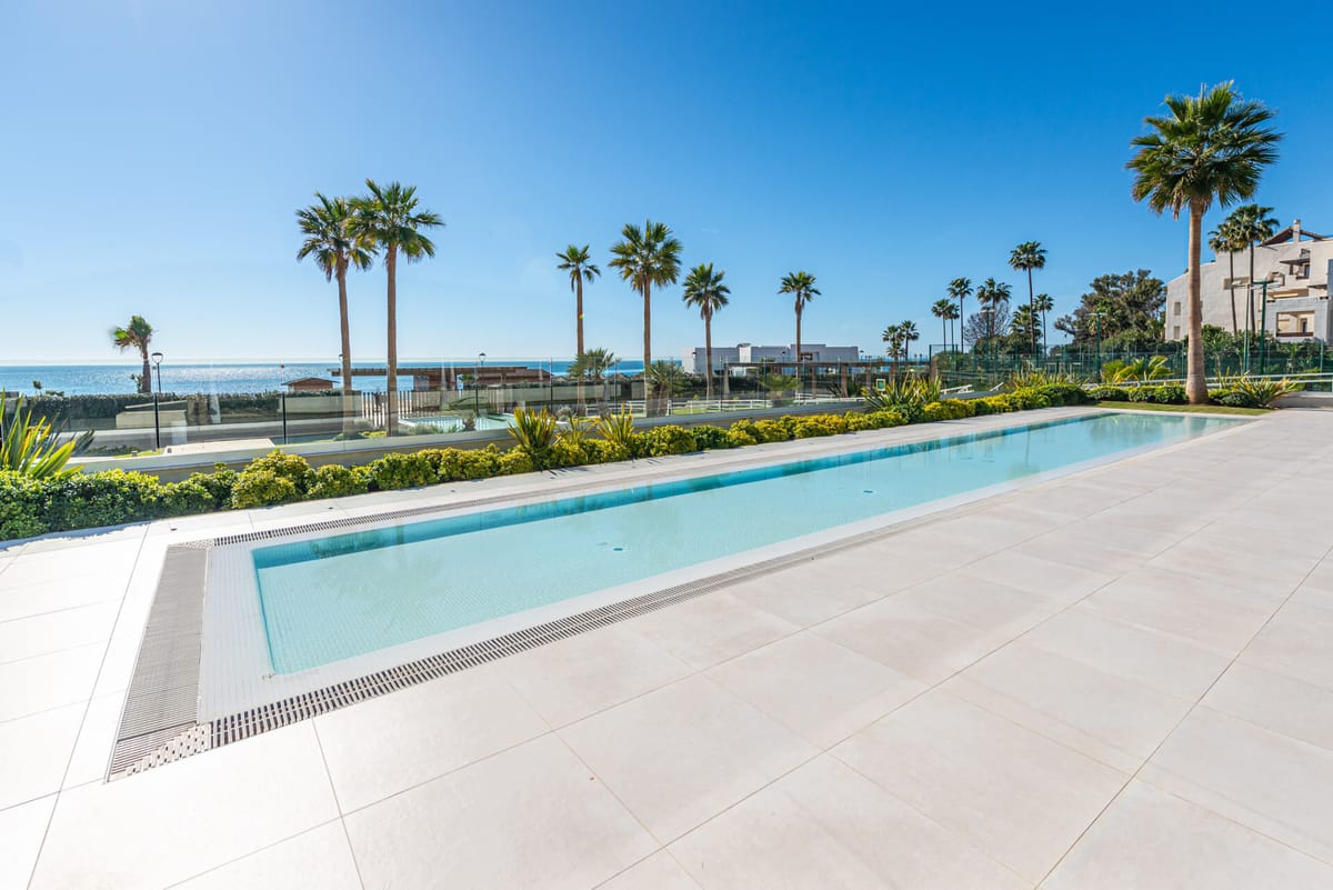 Beachfront Apartment with a Private Garden