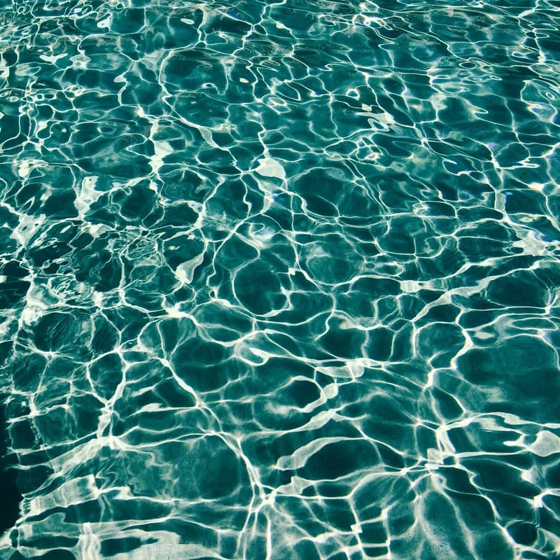 Sunlight rippling through clear Mediterranean water