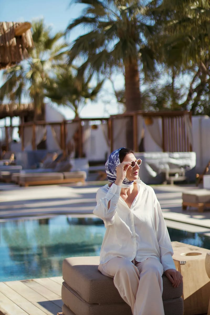 A woman speaking on the phone outdoors